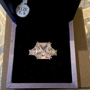 3 stone cubic ring. 5 kt cry  one carat on side pretty fun  SWETELOVE Jewelry